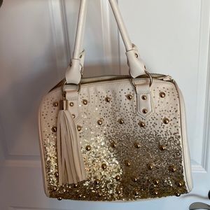 Charming Charlie white and gold purse